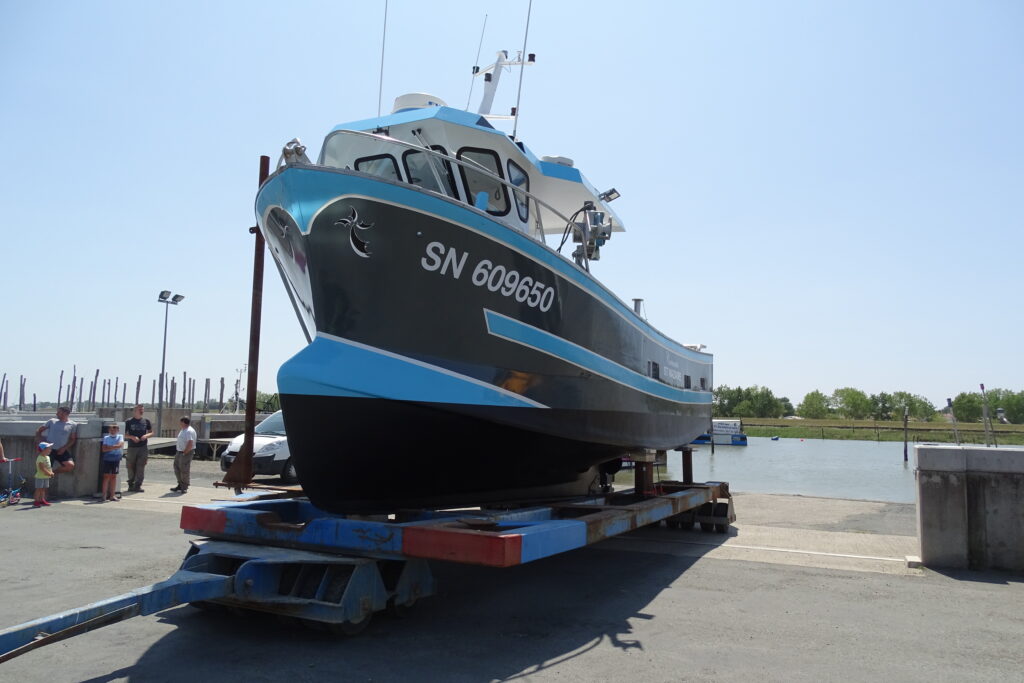 Trawler on a trailer at the yard after refit – refit by Plasti Pêche