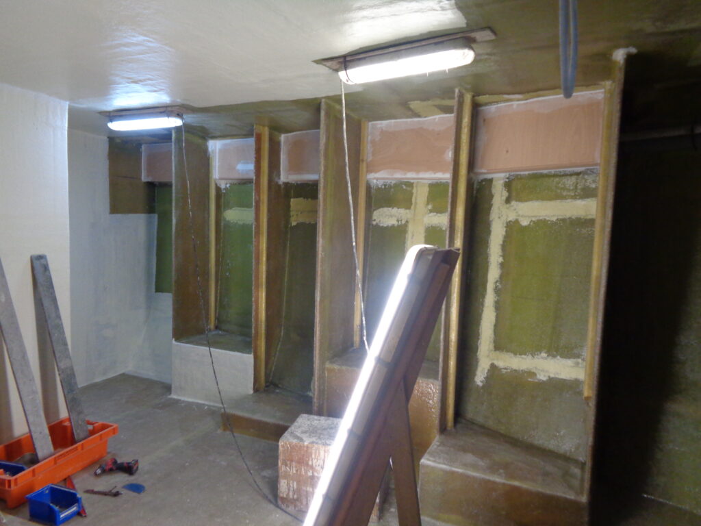 Fish hold during refit, bulkheads being prepared – fish hold refit by Plasti Pêche